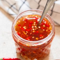 a jar of nuac cham a Vietnamese dipping sauce made of fish sauce.