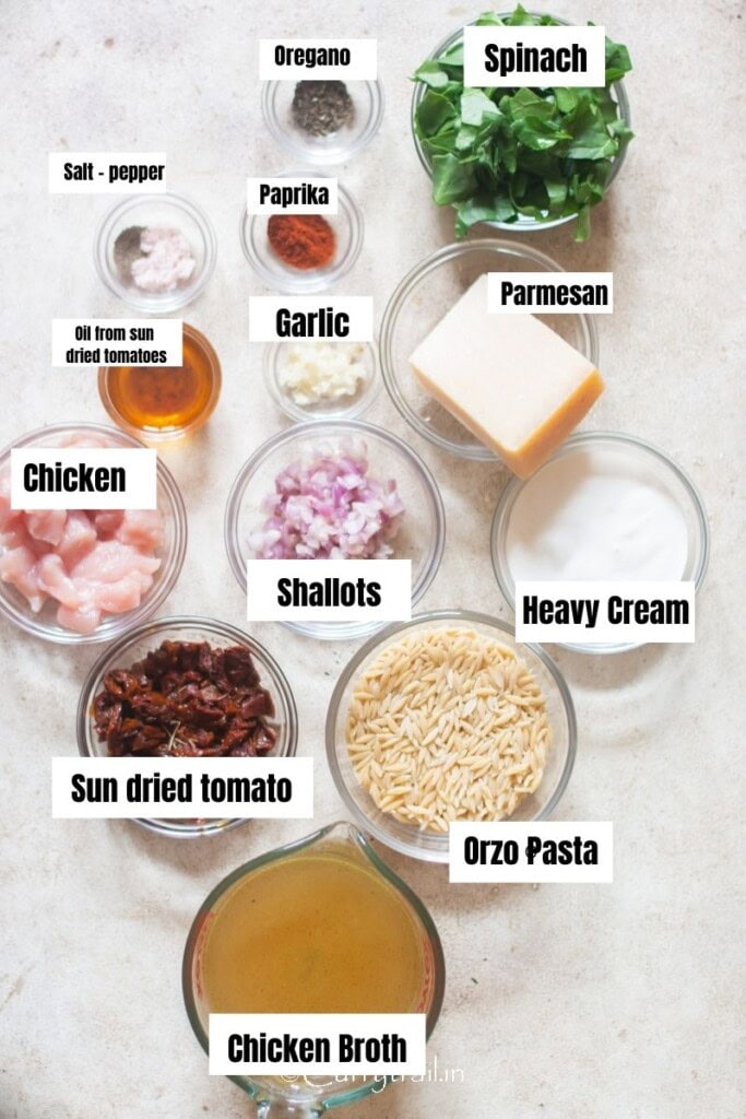 all ingredients for marry me chicken pasta on a table.