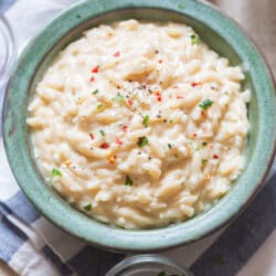 creamy orzo pasta served in a bowl.