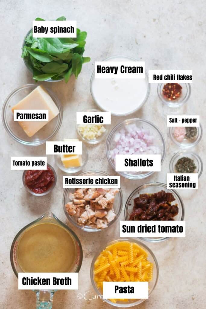 all ingredients for creamy marry me chicken soup arranged on a table.