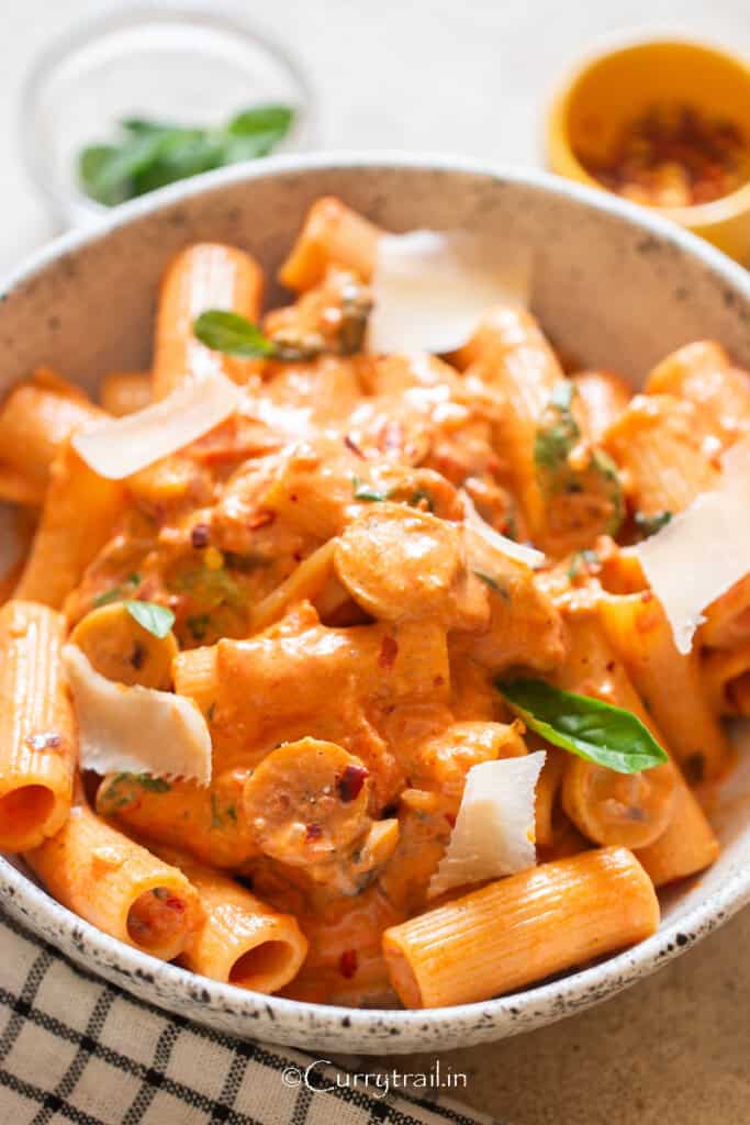 chicken sausage and pasta in creamy tomato sauce.