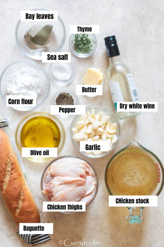 all the ingredients for chicken with 40 cloves of garlic on the table.