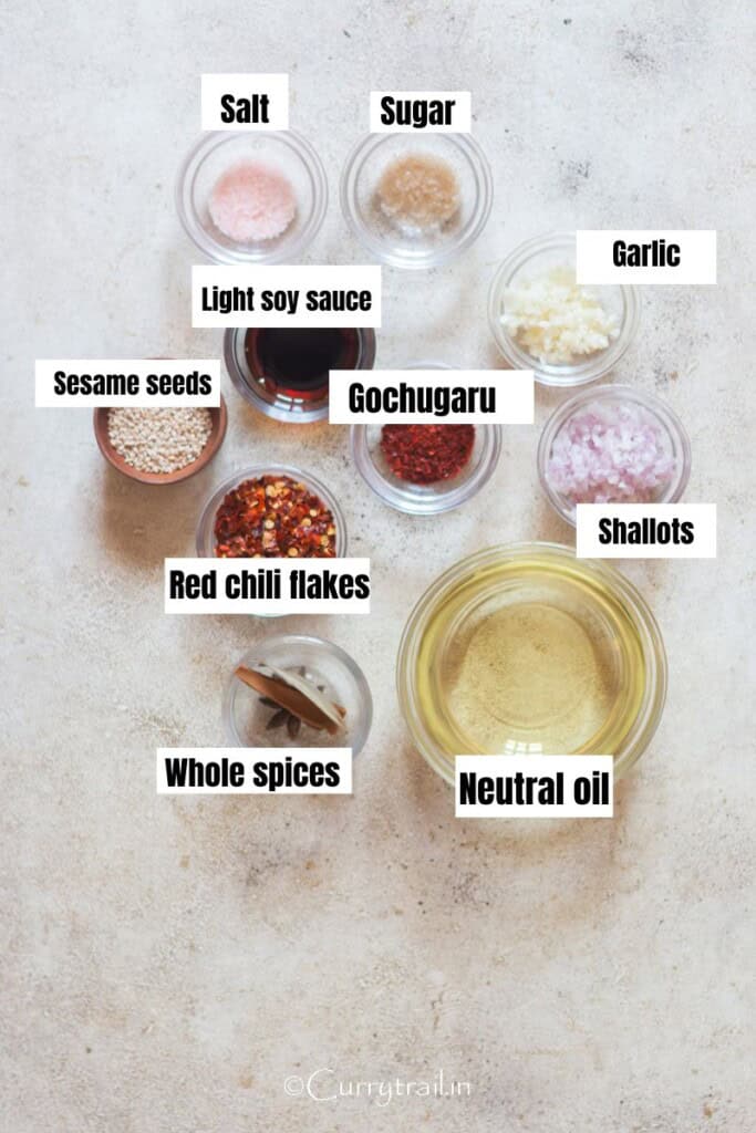 all ingredients of chili oil arranged on a table.