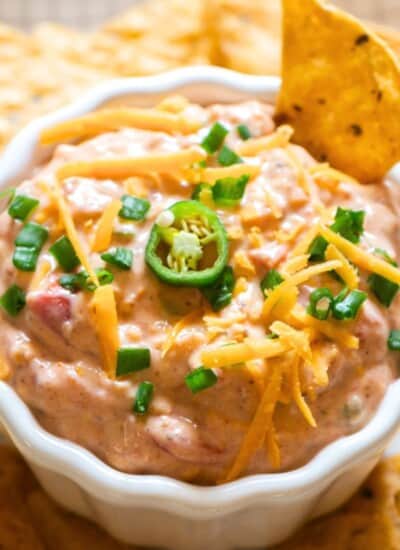 creamy boat dip served with nachos.