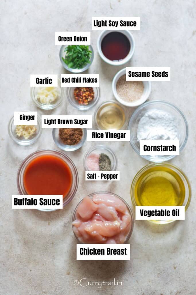 all ingredients for firecracker chicken arranged on table.