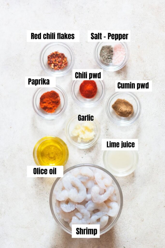all ingredients for spicy cilantro lime shrimp arranged on the table.
