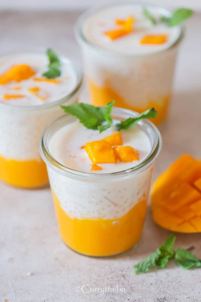 3 glass jars of mango puree and sweet coconut milk cream base.