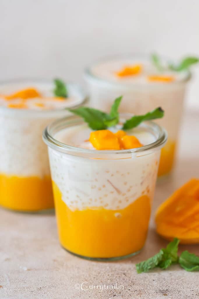 3 glass jars of mango puree and sweet coconut milk cream base.